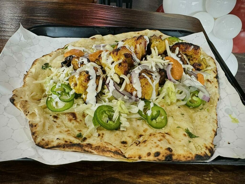 Nepali Cuisine; naan with sekuwa chicken