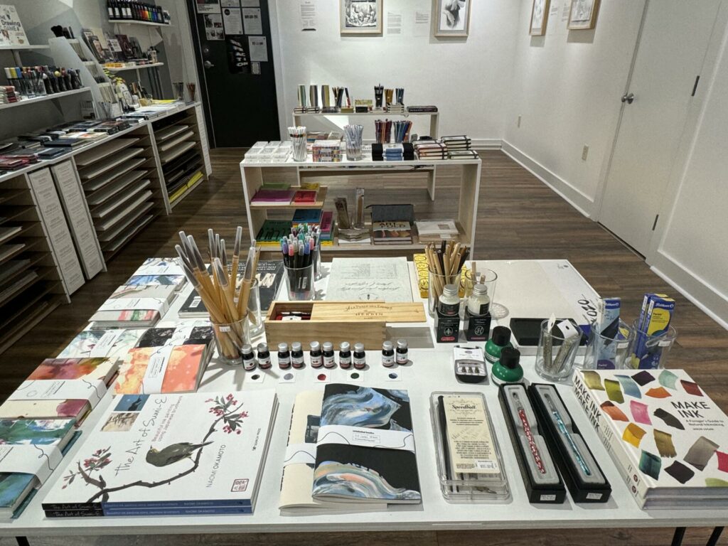 Paint samples, paint brushes, notebooks, informative art books, and other art supplies available in Lancaster, PA.